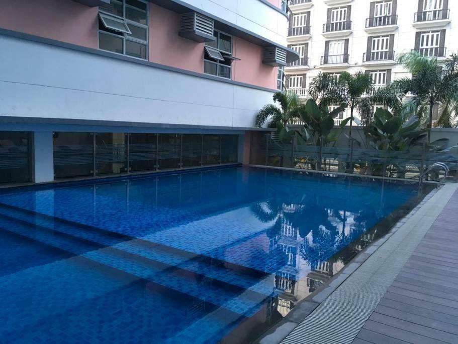 101 Newport Blvd Condotel Манила Экстерьер фото